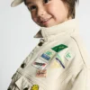 Kinderjas Snopdog - 20 jaar Referentie: KSNOP16A20H26